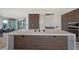 Spacious kitchen featuring stone countertops, stainless steel appliances, and a breakfast bar for casual dining at 1 Hughes Center Dr # 1901, Las Vegas, NV 89169