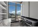 Chic laundry room with a sink, modern appliances and city views through a large window at 1 Hughes Center Dr # 1901, Las Vegas, NV 89169