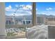 Cozy living area with floor-to-ceiling windows overlooking city views at 1 Hughes Center Dr # 1901, Las Vegas, NV 89169