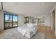 Stylish living room showcasing a comfortable sofa, a balcony, recessed lighting, and expansive city views at 1 Hughes Center Dr # 1901, Las Vegas, NV 89169
