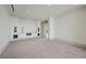 A spacious media room includes wall speakers and comfortable carpet flooring at 1 Hughes Center Dr # 1901, Las Vegas, NV 89169