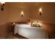 Peaceful spa area with a massage table, soft lighting, and elegant decor for ultimate relaxation at 1 Hughes Center Dr # 1901, Las Vegas, NV 89169