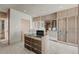 Spacious walk-in closet with custom shelving and drawers for optimal organization at 1 Hughes Center Dr # 1901, Las Vegas, NV 89169