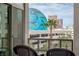 Balcony featuring wicker chairs and an ornate railing with Sphere views at 1 Hughes Center Dr # 308, Las Vegas, NV 89169