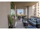 Spacious outdoor balcony with patio furniture, perfect for relaxing and enjoying the view at 1 Hughes Center Dr # 308, Las Vegas, NV 89169