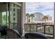 Cozy balcony featuring wicker chairs and an ornate railing with views of the MSG Sphere at 1 Hughes Center Dr # 308, Las Vegas, NV 89169