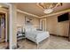 This cozy bedroom features a decorative ceiling and plush bedding for ultimate comfort and style at 1 Hughes Center Dr # 308, Las Vegas, NV 89169
