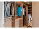 Spacious walk-in closet provides ample storage with custom shelving and a sleek design at 1 Hughes Center Dr # 308, Las Vegas, NV 89169