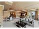 Inviting living space with a modern sofa, dining area, and bar, perfect for entertaining at 1 Hughes Center Dr # 308, Las Vegas, NV 89169