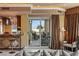 Bright living space leading to a balcony, featuring a wet bar and refined seating at 1 Hughes Center Dr # 308, Las Vegas, NV 89169