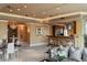 Spacious living area with a bar, elegant furnishings, and a seamless flow for entertaining guests at 1 Hughes Center Dr # 308, Las Vegas, NV 89169