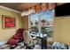 Cozy office space with a desk and comfortable seating, offering a quiet workspace with city views at 1 Hughes Center Dr # 308, Las Vegas, NV 89169