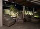 Cozy backyard patio with an outdoor firepit and comfortable outdoor seating at 10484 Rose Park Ave, Las Vegas, NV 89135