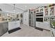 Beautiful kitchen with modern appliances, stylish cabinets, and an open view to the living area at 10484 Rose Park Ave, Las Vegas, NV 89135