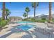 This community offers a sparkling pool and spa surrounded by lounge seating, perfect for relaxation at 10484 Rose Park Ave, Las Vegas, NV 89135