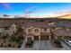 Stunning aerial view features lush landscaping and a well-manicured front yard at 1073 Via Della Costrella, Las Vegas, NV 89101