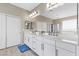 Bright bathroom with double vanities, modern fixtures, and plenty of storage at 1073 Via Della Costrella, Las Vegas, NV 89101