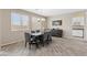 Well-lit dining room with a modern table and chairs at 1073 Via Della Costrella, Las Vegas, NV 89101