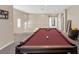 Spacious game room with a billiard table and neutral tones for relaxed entertaining at 1073 Via Della Costrella, Las Vegas, NV 89101