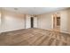 Large bedroom featuring neutral walls, carpet, multiple closets, and an en-suite bathroom at 11238 Meadow Cove St, Las Vegas, NV 89179