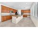 Well-equipped kitchen with stainless steel appliances, granite countertops, and plenty of room for meal preparation at 1155 Phillip Island St, Henderson, NV 89052