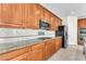 Well-appointed kitchen featuring stainless steel appliances, gas range, and ample storage for all your cooking needs at 1155 Phillip Island St, Henderson, NV 89052