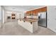 Modern kitchen with a large island, stainless steel appliances, and plenty of cabinet space for storage at 1155 Phillip Island St, Henderson, NV 89052