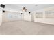 Large media room featuring neutral carpet and bright window lighting at 1155 Phillip Island St, Henderson, NV 89052