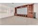 Large media room features custom built-ins and space for entertaining at 1155 Phillip Island St, Henderson, NV 89052