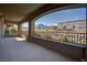 This balcony offers ample space with views of the nearby mountains and community landscape at 11952 Girasole Ave, Las Vegas, NV 89138