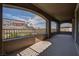 This balcony offers ample space with views of the lush, community landscape at 11952 Girasole Ave, Las Vegas, NV 89138