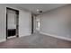 A large bedroom with carpet, closet, and white trim creates an inviting space at 11952 Girasole Ave, Las Vegas, NV 89138
