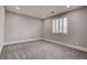 A bright bedroom featuring neutral walls, carpet flooring, recessed lighting, and a shuttered window at 11952 Girasole Ave, Las Vegas, NV 89138