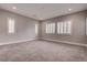 Neutral bedroom with carpet, plantation shutters allowing for plenty of natural light at 11952 Girasole Ave, Las Vegas, NV 89138