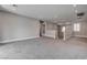 Open bonus room area with carpet, neutral walls, recessed lights, and access to stairs and hallway at 11952 Girasole Ave, Las Vegas, NV 89138