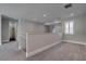 Open bonus room area with carpet, neutral walls, recessed lights, shuttered windows, and access to bathroom at 11952 Girasole Ave, Las Vegas, NV 89138