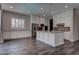 Spacious kitchen features a large center island, stainless steel appliances, and plenty of cabinet and counter space at 11952 Girasole Ave, Las Vegas, NV 89138