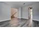 Spacious living area with tile floors, neutral paint, and open access to the staircase at 11952 Girasole Ave, Las Vegas, NV 89138