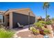 Outdoor patio with shade screens, comfortable seating, and landscaped surroundings at 1309 Vista Del Monte Dr, Mesquite, NV 89027