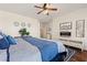 Comfortable bedroom showcasing a modern ceiling fan and tasteful wall decorations at 1309 Vista Del Monte Dr, Mesquite, NV 89027
