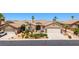 Charming single-story home with desert landscaping, stucco walls, tile roof, and two-car garage at 1309 Vista Del Monte Dr, Mesquite, NV 89027