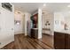 Hallway view showcasing access to the kitchen and a room with wood floors at 1309 Vista Del Monte Dr, Mesquite, NV 89027