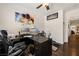 Comfortable office with hardwood floors, dark desk, and an ergonomic chair at 1309 Vista Del Monte Dr, Mesquite, NV 89027