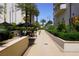 Outdoor courtyard with table seating for leisure and dining at 145 E Harmon Ave # 27619, Las Vegas, NV 89109