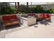 Elegant outdoor lounge area with comfortable seating and a modern fire pit feature at 145 E Harmon Ave # 27619, Las Vegas, NV 89109