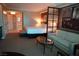 Comfortable main bedroom with king size bed, sofa and ensuite bathroom at 145 E Harmon Ave # 27619, Las Vegas, NV 89109