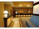 Reception desk with lamps and seating area at 145 E Harmon Ave # 27619, Las Vegas, NV 89109