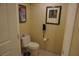 Toilet and phone mounted on the wall in the bathroom at 145 E Harmon Ave # 27619, Las Vegas, NV 89109