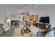 Bright living room boasts tile floors, fireplace, and an open floor plan at 1632 Royal Canyon Dr, Las Vegas, NV 89128