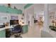 Open concept office offering built in shelving with an archway offering a view of the dining room at 1632 Royal Canyon Dr, Las Vegas, NV 89128